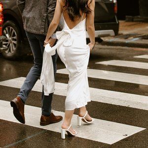 MESHKI Kailey Low Back Maxi Dress with Detachable Bow Train - White